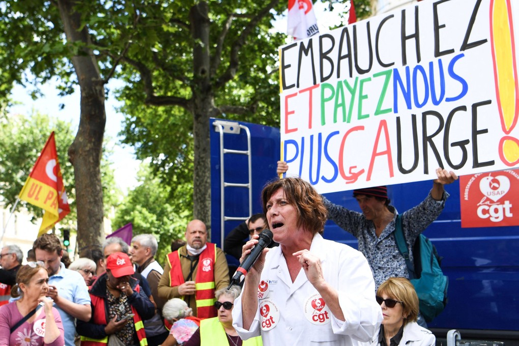 A demonstration to support French hospital staff members is seen in front of the ministry of Health in Paris on Tuesday. Photo: AFP
