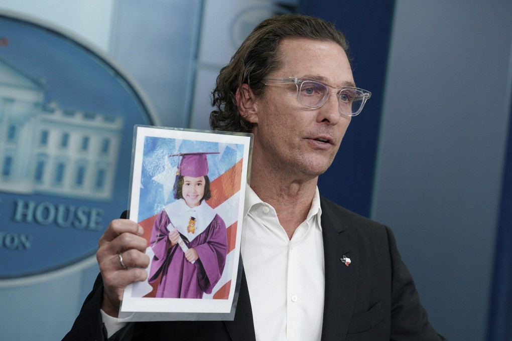 Actor Matthew McConaughey holds a photo of a victim in the recent mass shooting at a junior school in Uvalde, Texas, during a press briefing at the White House in Washington on Tuesday. Photo: TNS