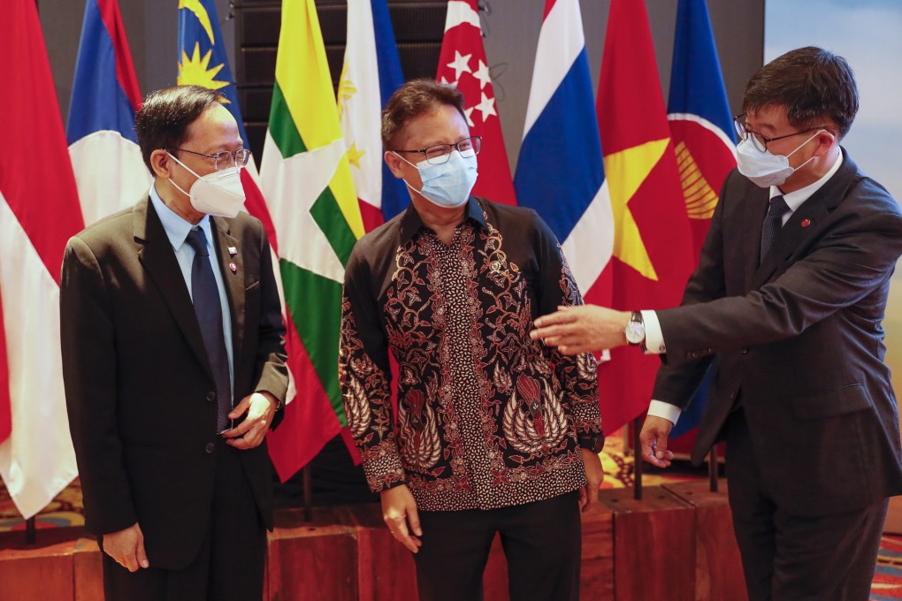 From the left, Myanmar Health Minister Thet Khaing Win, Indonesian Health Minister Budi Gunadi Sadikin and South Korea’s Vice-Health Minister Lee Ki-il meet at the Asean Plus Three Health Ministers’ Meeting in Nusadua, Bali, Indonesia, on May 15. Photo: EPA-EFE
