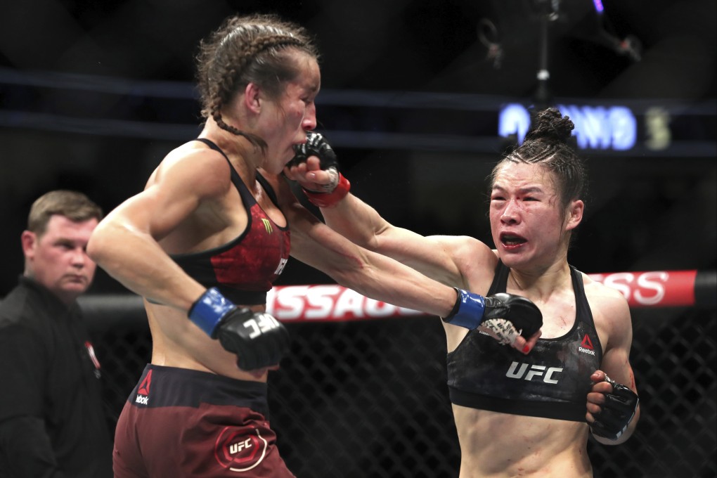 Zhang Weili punches Joanna Jedrzejczyk at UFC 248. Photo: AP