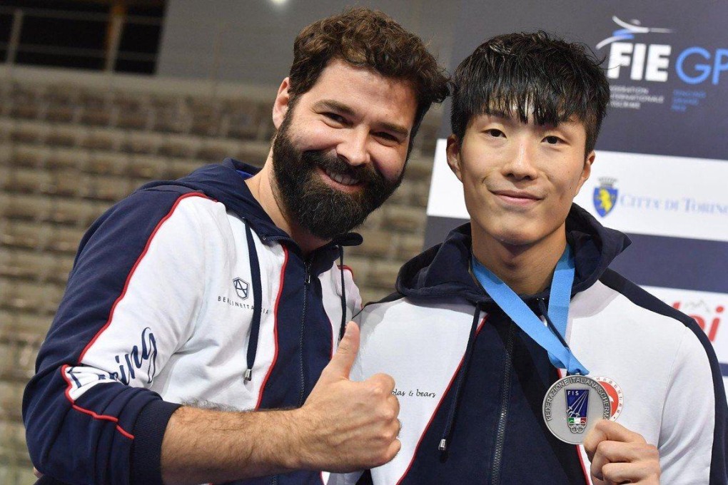 Cheung Ka-long and coach Gregory Koenig. Photo: FIE