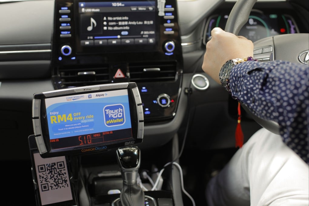 Ant Group is partnering with Singapore’s ComfortDelGro Taxi to handle mobile payments for fares made through Malaysia’s Touch ‘n Go eWallet and South Korea’s Kakao Pay. Photo: Handout