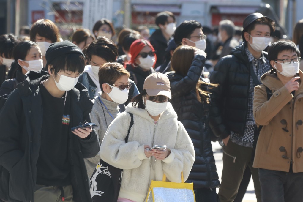 When the coronavirus pandemic began over two years ago, people in Japan quickly donned masks en masse with little complaint. But now the government has relaxed its guidance on outdoor mask usage, the message appears not to be filtering through. Photo: AP