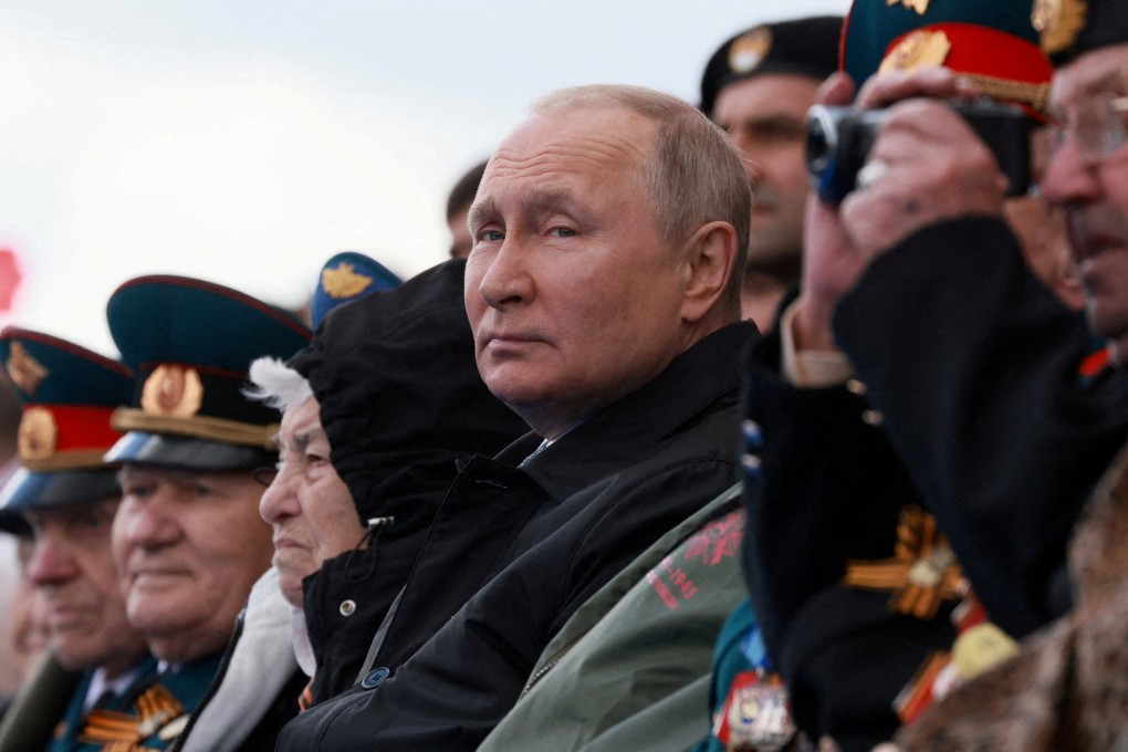 Russian President Vladimir Putin watches a military parade on Victory Day in Moscow in May. Photo: Sputnik via Reuters