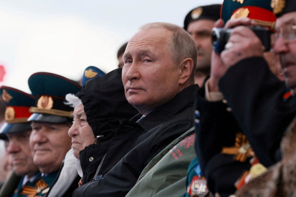 Russian President Vladimir Putin watches a military parade on Victory Day in Moscow in May. Photo: Sputnik via Reuters