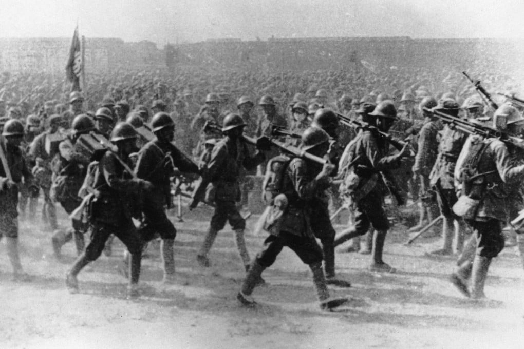 Communist troops of the Chinese Red Army on the march during an assault on Shanghai at the end of the Chinese Civil War, on May 21, 1949. Photo: Getty Images