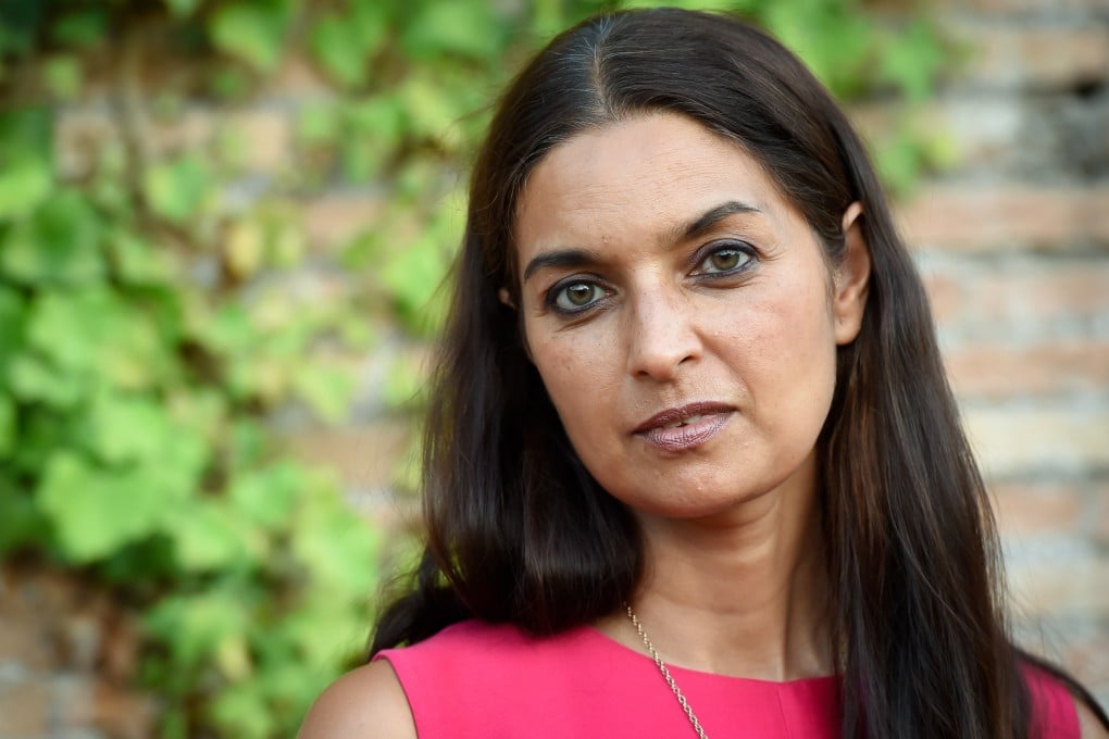 American writer Jhumpa Lahiri in Rome. “Reading, writing, and living in Italian, I feel ... more attentive ... and curious,” she writes in Translating Myself and Others. Photo: Getty Images