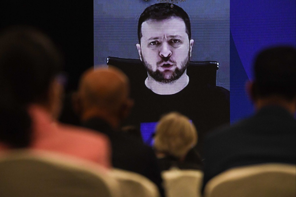 Ukraine’s President Volodymyr Zelensky addresses participants at the Shangri-La Dialogue summit via a video link. Photo: AFP