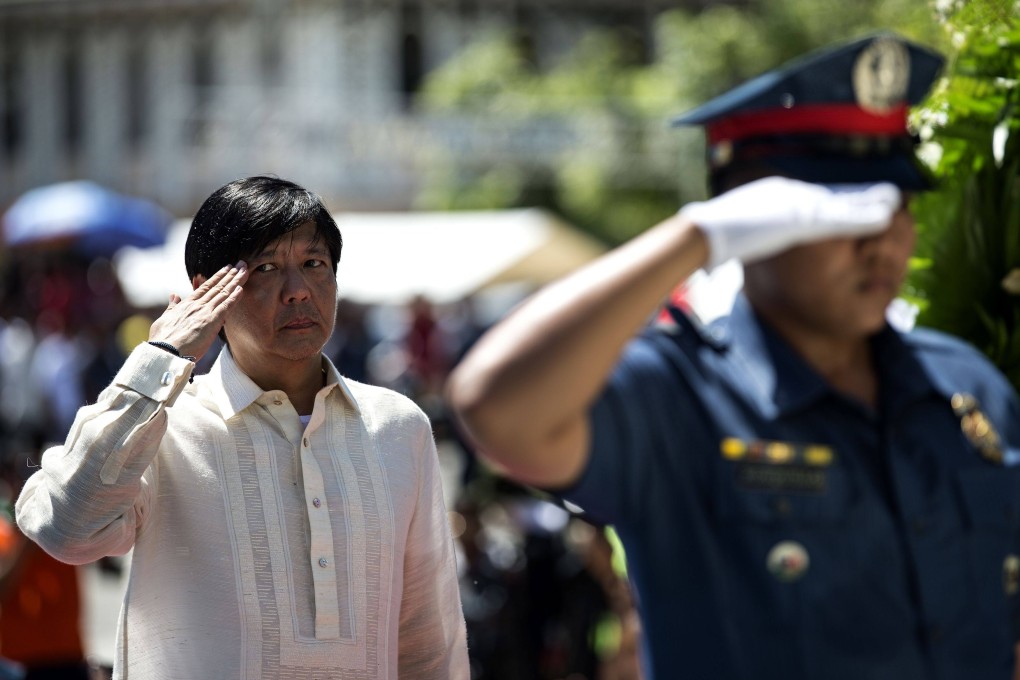 President-elect Ferdinand “Bongbong” Marcos Jnr, son of the late dictator Ferdinand Marcos, salutes as he visits a monument to remember his father. File photo: AFP