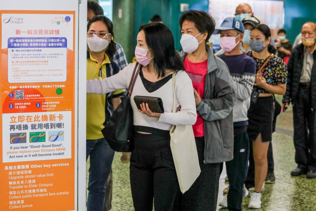 Residents queue to collect their consumption vouchers at Sham Shui Po MTR station earlier this year. Photo: Yik Yeung-man