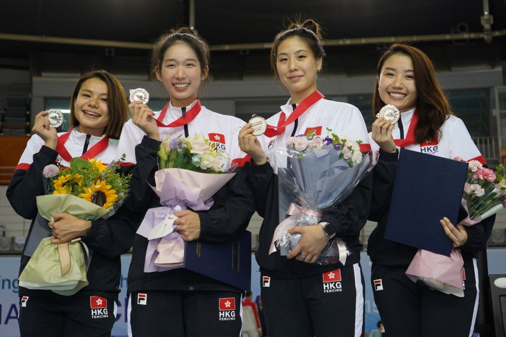 A delighted Hong Kong epee team in the medal ceremony. From Left: Coco Lin, Vivian Kong, Natalie Chan and Moonie Chu. Photo: FIE