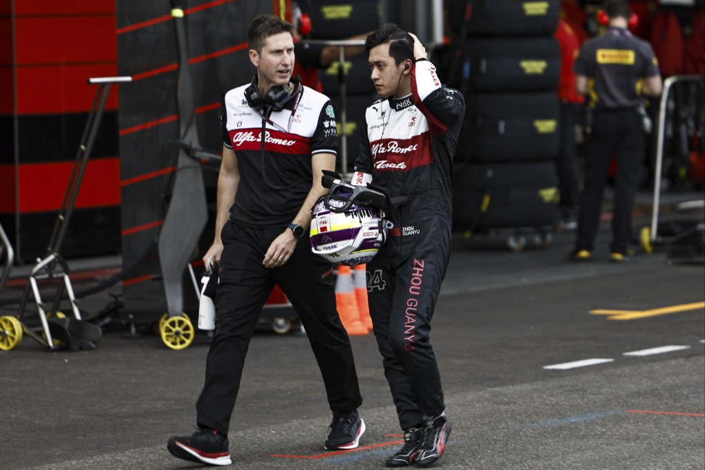 Alfa Romeo’s Zhou Guanyu Zhou (right) of Alfa Romeo Racing ORLEN walks along the pitlane at the Baku City Circuit. Photo: EPA-EFE