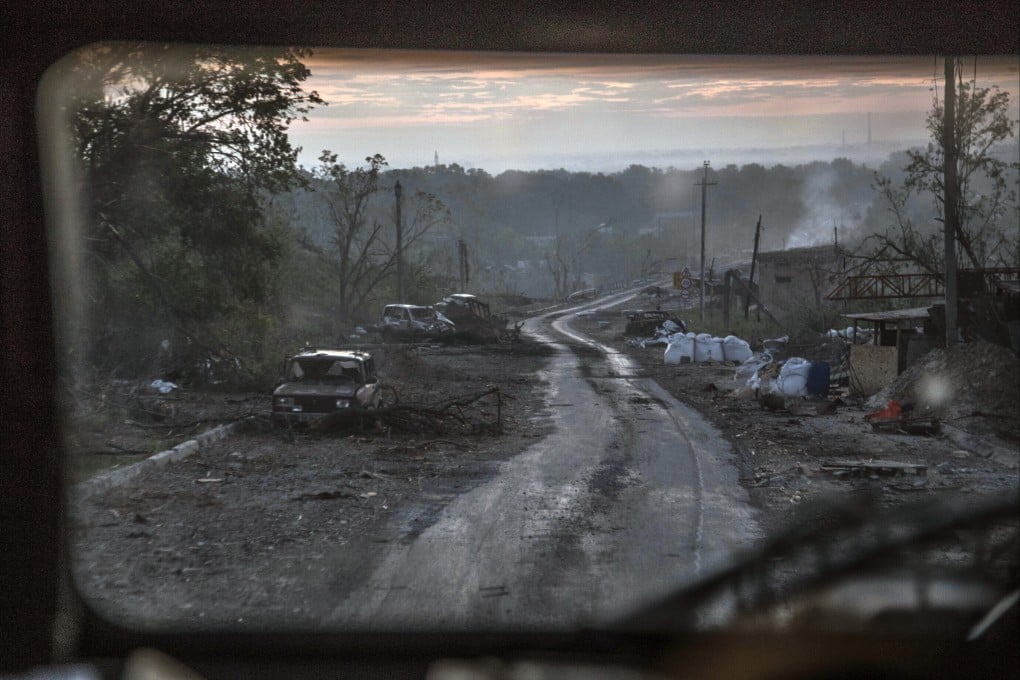 The gutted remains of cars along a road at the front line in Sievierodonetsk in the Luhansk region of Ukraine. Photo: AP