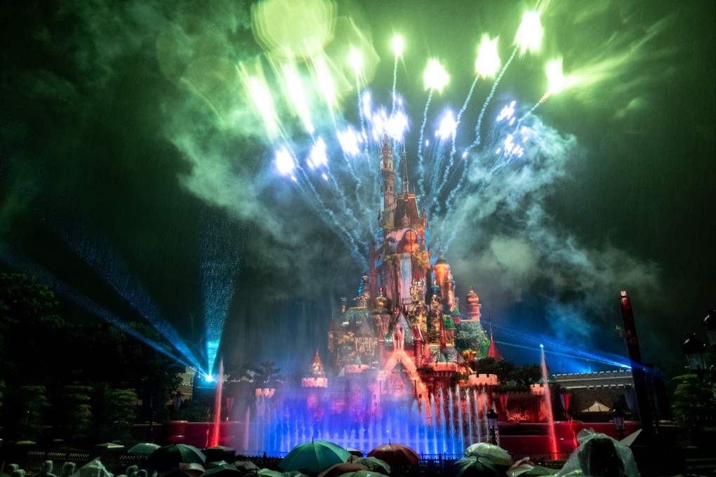 Hong Kong Disneyland debuts its new fireworks display, Momentous, which lights up the sky above the new Castle of Magical Dreams. Photo: Connor Mycroft