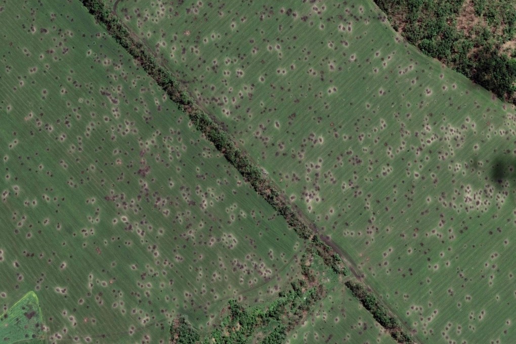 This satellite image shows fields peppered with hundreds of artillery craters near Sloviansk, a city in the Donetsk region that Moscow wants to control of. Photo: Maxar Technologies via AFP