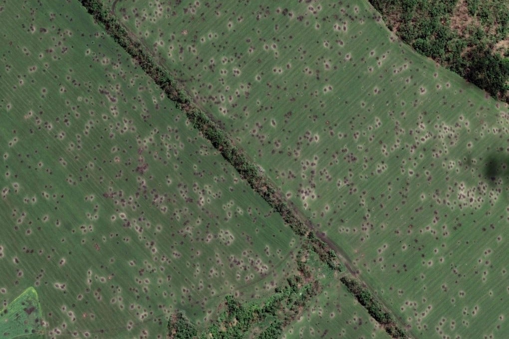 This satellite image shows fields peppered with hundreds of artillery craters near Sloviansk, a city in the Donetsk region that Moscow wants to control of. Photo: Maxar Technologies via AFP
