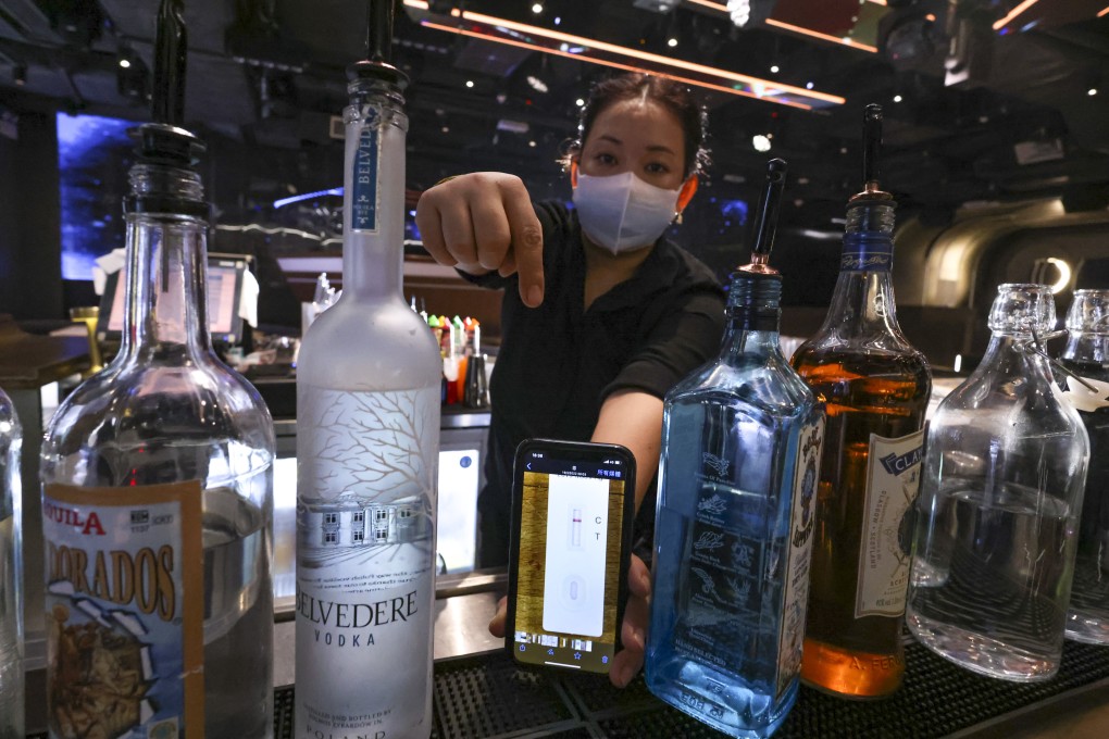 Customers must show proof of a negative rapid antigen test result obtained within 24 hours before entering bars, pubs, clubs or nightclubs from June 16 to 29. Photo: Dickson Lee