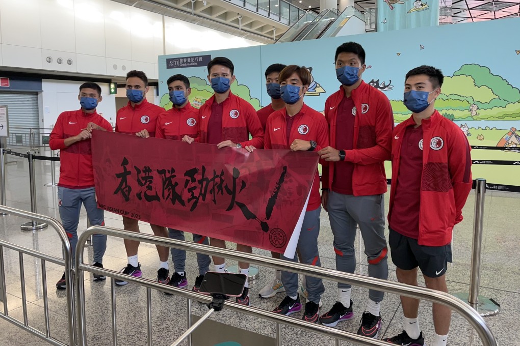 The eight players who completed the journey back from India arrive at Hong Kong airport. Photo: Chan Kin-wa