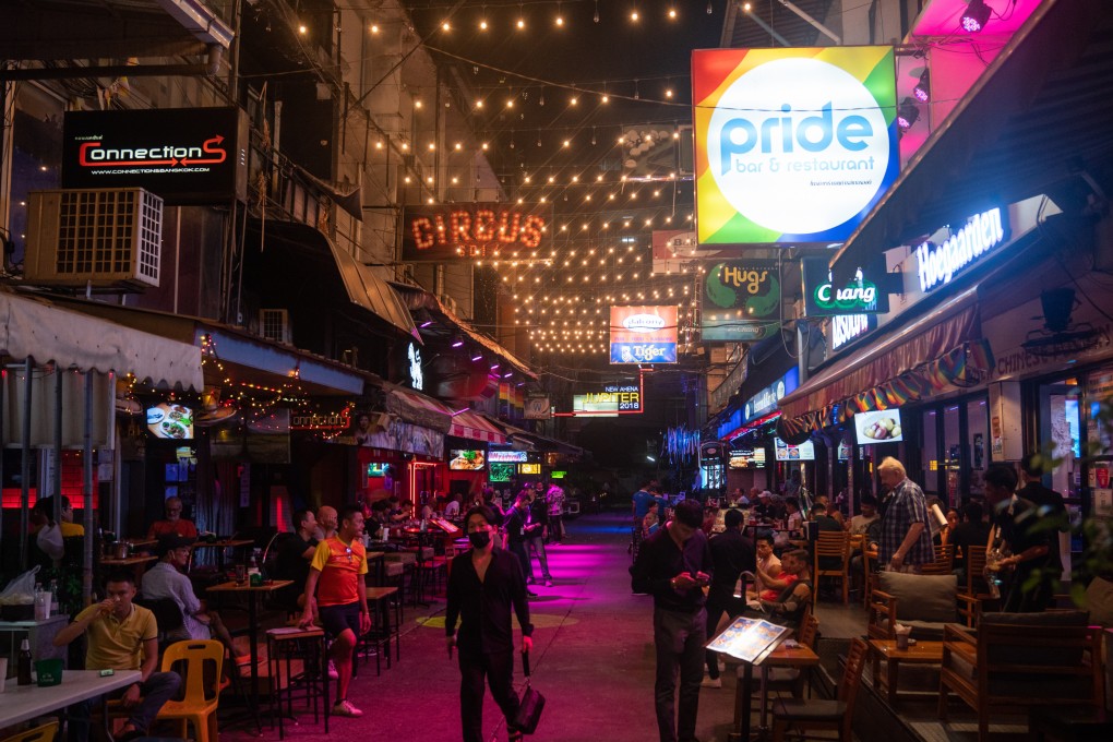 Customers at the outside seating areas of bars and restaurants in the Patpong entertainment district of Bangkok, Thailand. Photo: Bloomberg