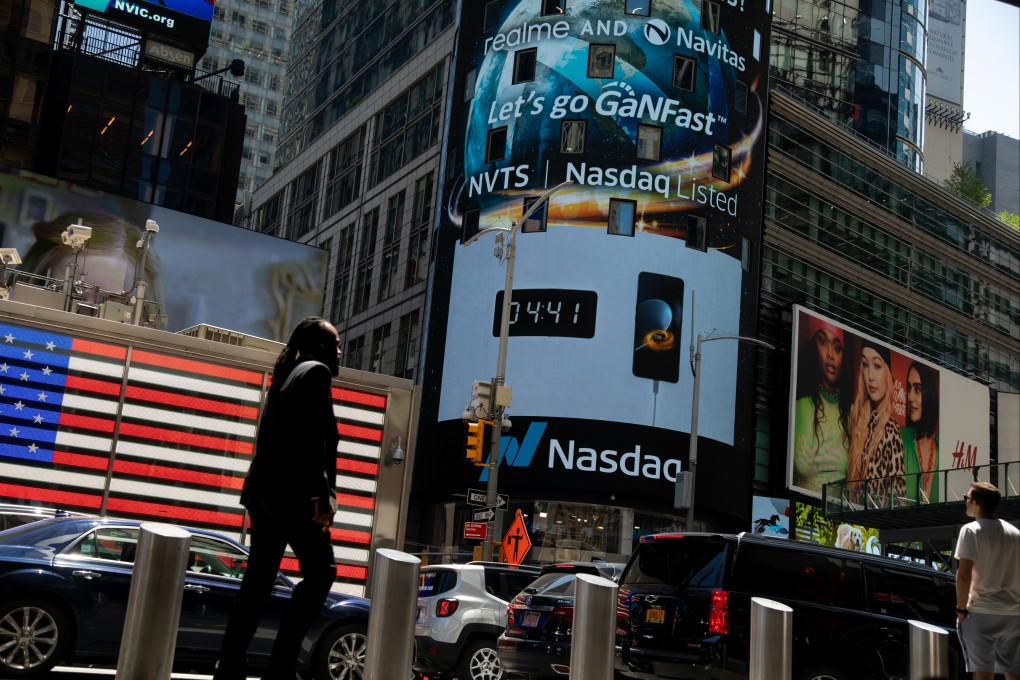 Pedestrians in front of the Nasdaq MarketSite in New York, US, on Wednesday, June 15, 2022. Photo: Bloomberg