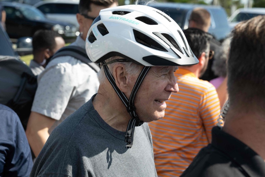 US President Joe Biden greets well-wishers following a bike ride on Saturday. Photo: AFP