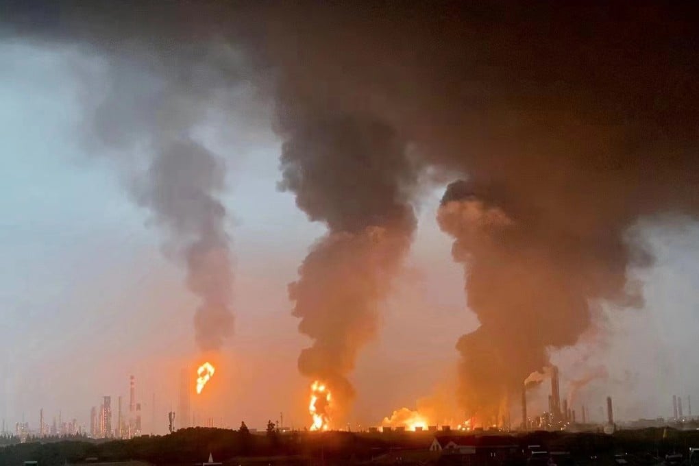 Flames and smoke billow from the ethylene glycol plant area of Sinopec Shanghai Petrochemical. Photo: Xinhua