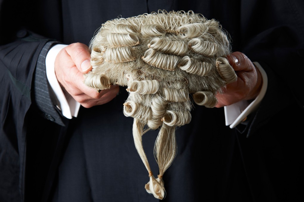A barrister holding a wig Photo: Shutterstock