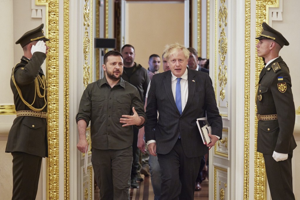 Ukrainian President Volodymyr Zelensky and British Prime Minister Boris Johnson walk together to a meeting in Kyiv on Friday. Photo: Ukrainian presidential press service via EPA-EFE