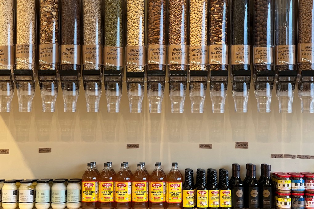 Bulk-food dispensers and other food products ready for customers at Live Zero’s soon-to-open flagship store in Quarry Bay, Hong Kong.
