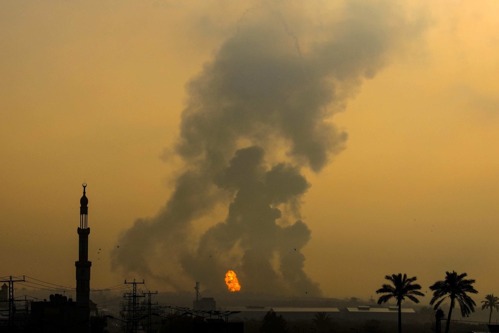 Fire erupts following an Israeli airstrike south of Gaza City on Saturday. Photo: AFP