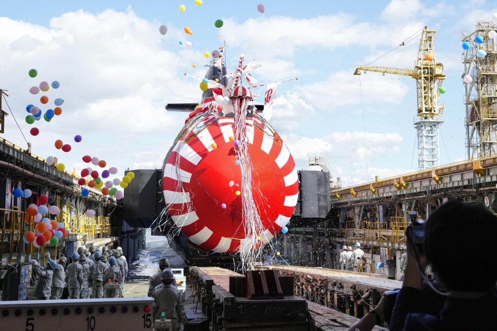 A diesel-powered Japan Maritime Self-Defence Force submarine is launched at a ceremony in Kobe last year. Photo: Kyodo