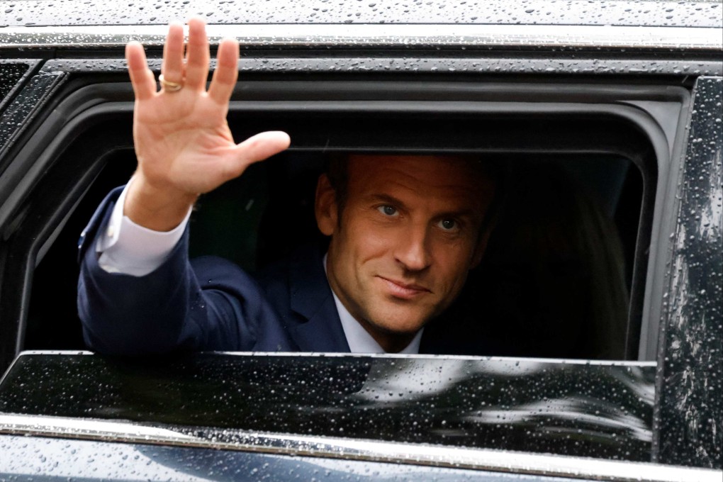 France’s President Emmanuel Macron after casting his vote. Photo: AFP