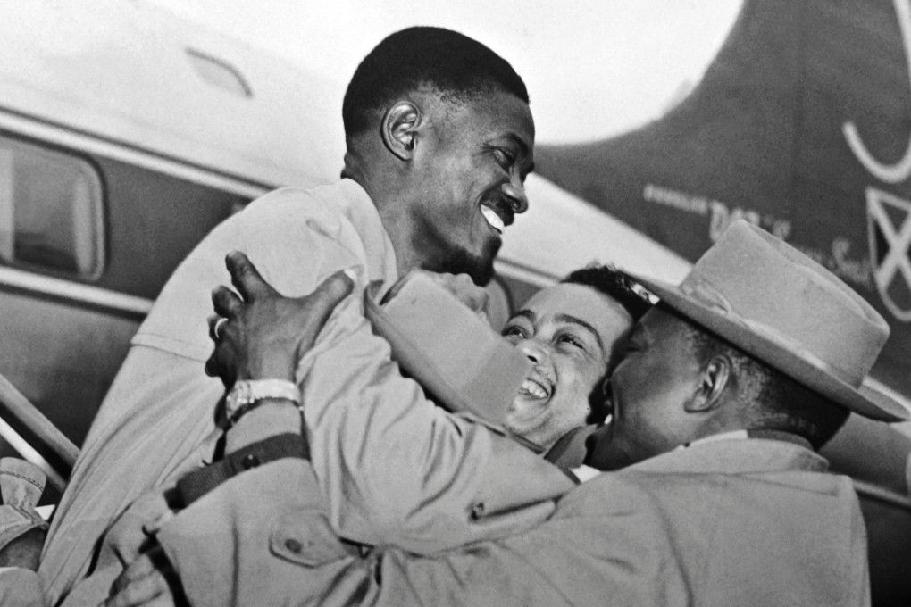 Patrice Lumumba being welcomed at Brussels airport in 1960. He was murdered the following year. File photo: AFP