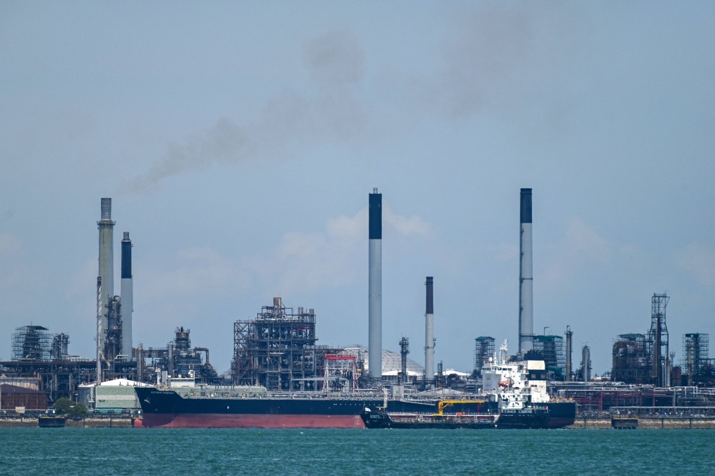 A vessel docks alongside the Shell refinery on Pulau Bukom in Singapore. Photo: AFP