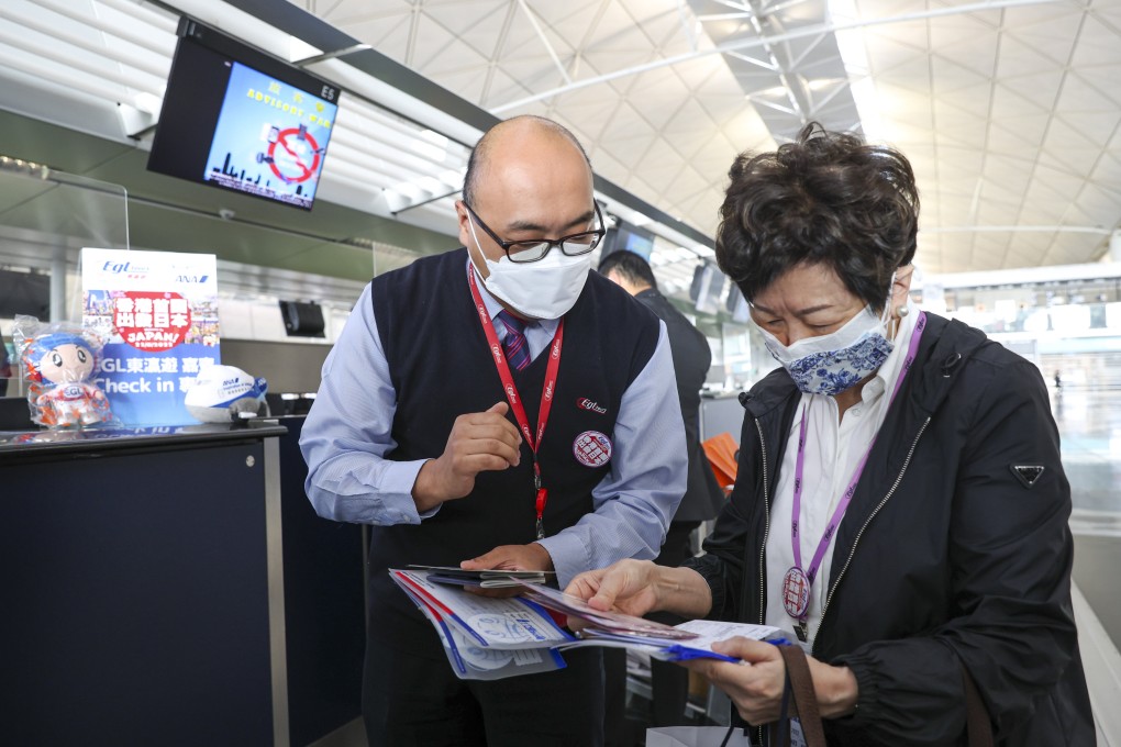 A tour member checks in at the ANA counter at Hong Kong International Airport on Wednesday. Photo: Yik Yeung-man