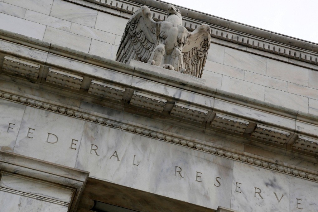 An eagle sits atop the US Federal Reserve building’s facade in Washington. Photo: Reuters