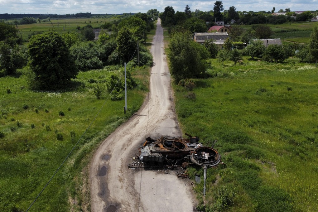 A ruined tank on the outskirts of Kyiv. EU leaders are expected to grant war-torn Ukraine ‘candidate status’ to join the bloc. Photo: AP