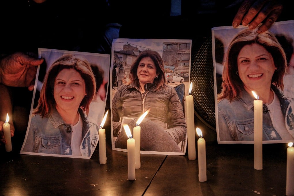 Activists take part in a candlelight vigil in Lebanon to denounce the killing of journalist Shireen Abu Akleh. File photo: dpa