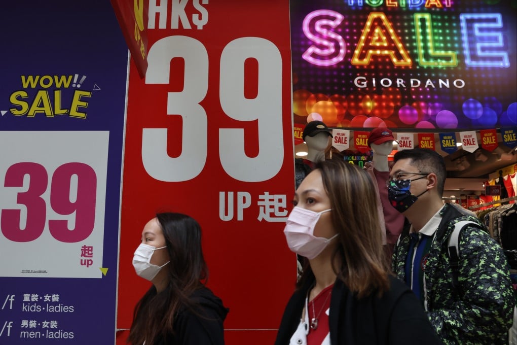 People walk past a Giordano store in Central in November 2021. Photo: Nora Tam