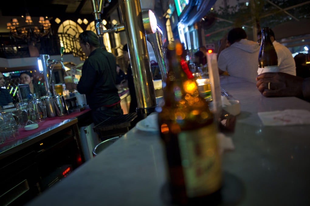 While drinking is not prohibited for any religion in Indonesia’s bars, the act itself is frowned upon by conservative Muslims. File photo: AFP