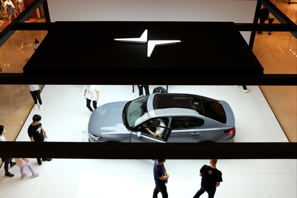 People view a Polestar 2 electric sedan in a shopping mall in Shanghai on May 5, 2020. The company’s is set to begin trading in New York on Friday via a merger with a special-purpose acquisition company. Photo: Reuters