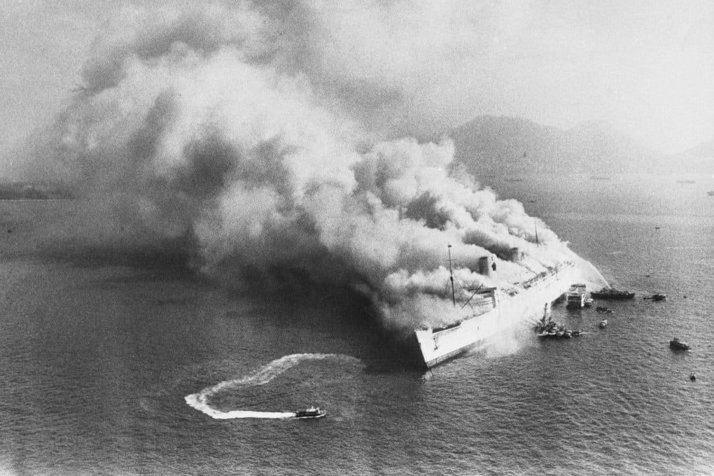 Smoke belches from the burning Seawise University, formerly known as the Queen Elizabeth, in Hong Kong’s Victoria Harbour, in 1972. Photo: SCMP