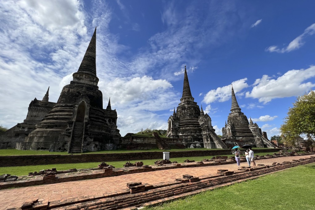 The three bell-shaped Buddhist stupas at Wat Phra Sri Sanpetch in Ayutthaya’s  old town, in Thailand, house the ashes of 15th-century kings. The temple is one of several on the itinerary of a luxury boat trip run by Anantara. Photo: Penny Watson
