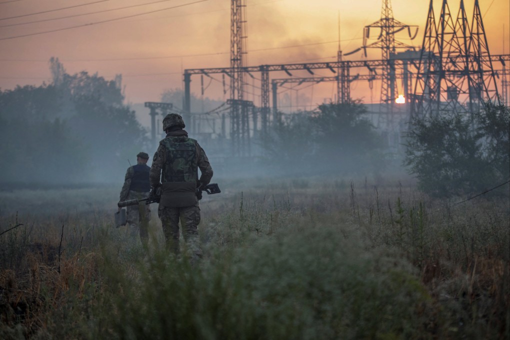 Ukrainian soldiers patrolling an area of Sievierodonetsk last week. Photo: Reuters