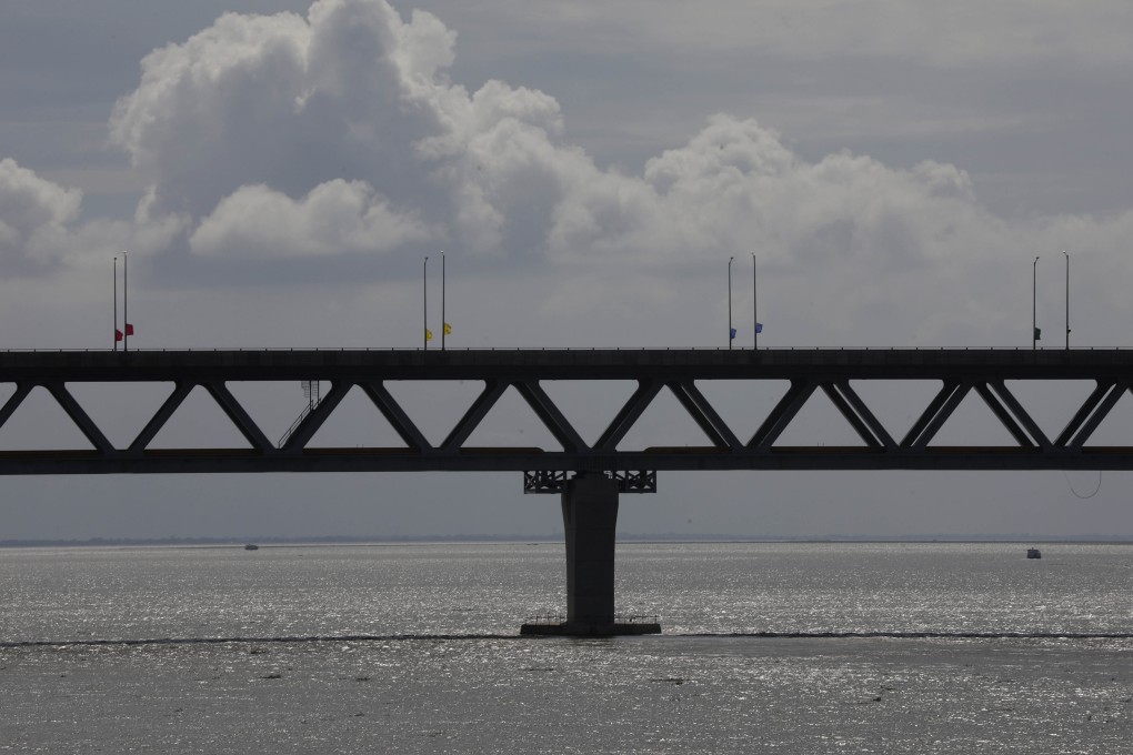 Bangladesh’s longest bridge, which took eight years to build amid setbacks involving political conflict and corruption allegations, stands over the Padma River. Photo: AP