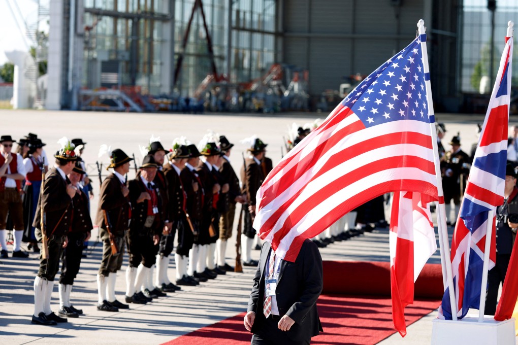 People prepare for the arrival of G7 leaders at Franz-Josef-Strauss airport in Munich, Germany on Saturday. Photo: Reuters
