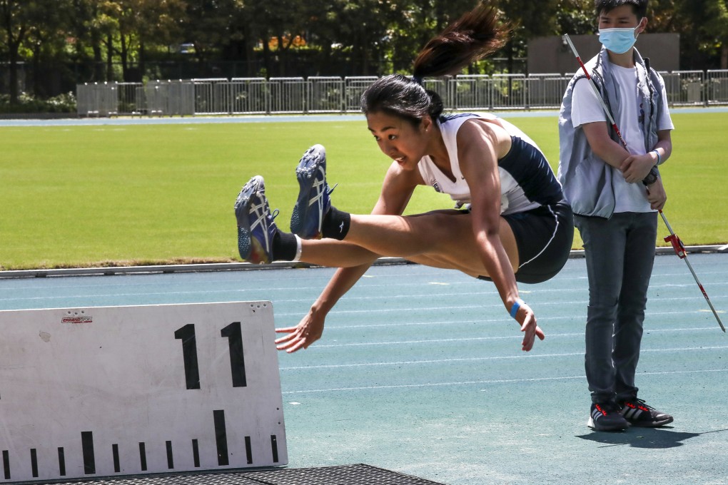 Triple-jumper Shannon Chan on her way to victory at the Hong Kong Athletics Championships on Sunday. Photo: Jonathan Wong