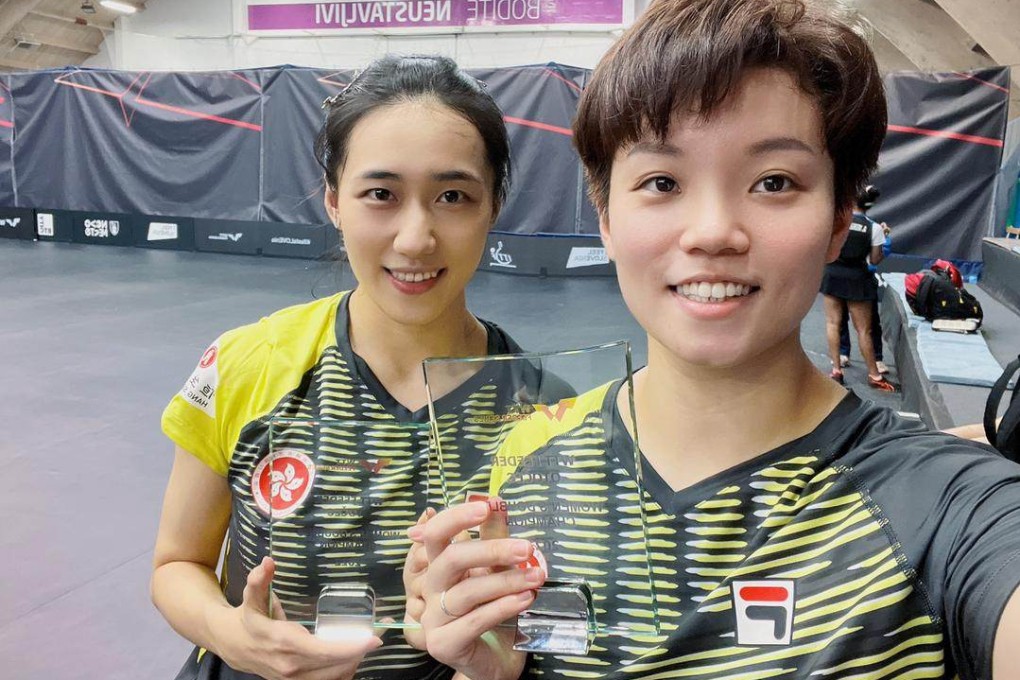 Doo Hoi-kem (front) and Zhu Chengzhu celebrate their success at the WTT Feeder event in Otocec. Photo: Hong Kong Table Tennis Association