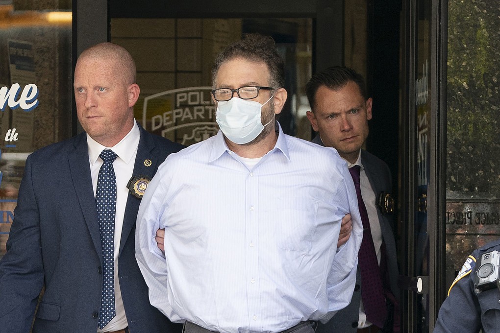 Glenn Hirsch, centre, is facing one count of murder for the shooting death of Zhiwen Yan and two counts of criminal possession of a weapon. Photo: New York Daily News / TNS