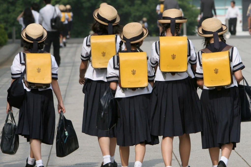 Children walk home from school in Tokyo. Japan is undergoing its biggest expansion in international education since 2018. Photo: Reuters